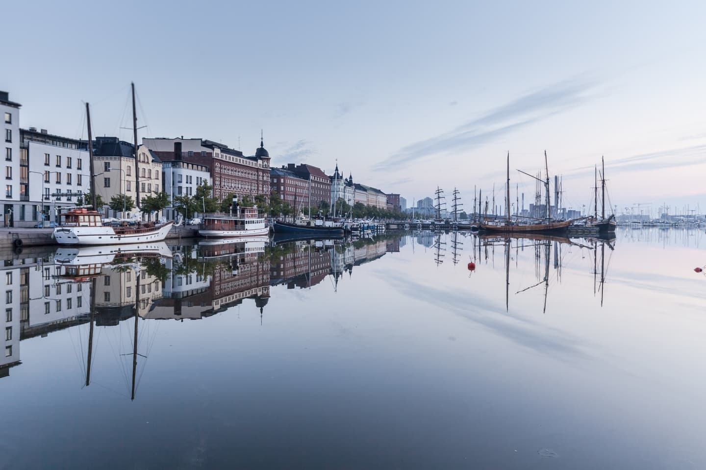 Scenic houses by a body of water in Helsinki